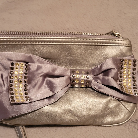 Candie's Silver Sequined Bow Wristlet - Picture 7 of 8